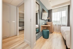 Family Room | 1 bedroom, in-room safe, desk, laptop workspace