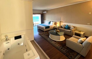 Grand Suite, Balcony, Sea View | Minibar, in-room safe, desk, blackout drapes