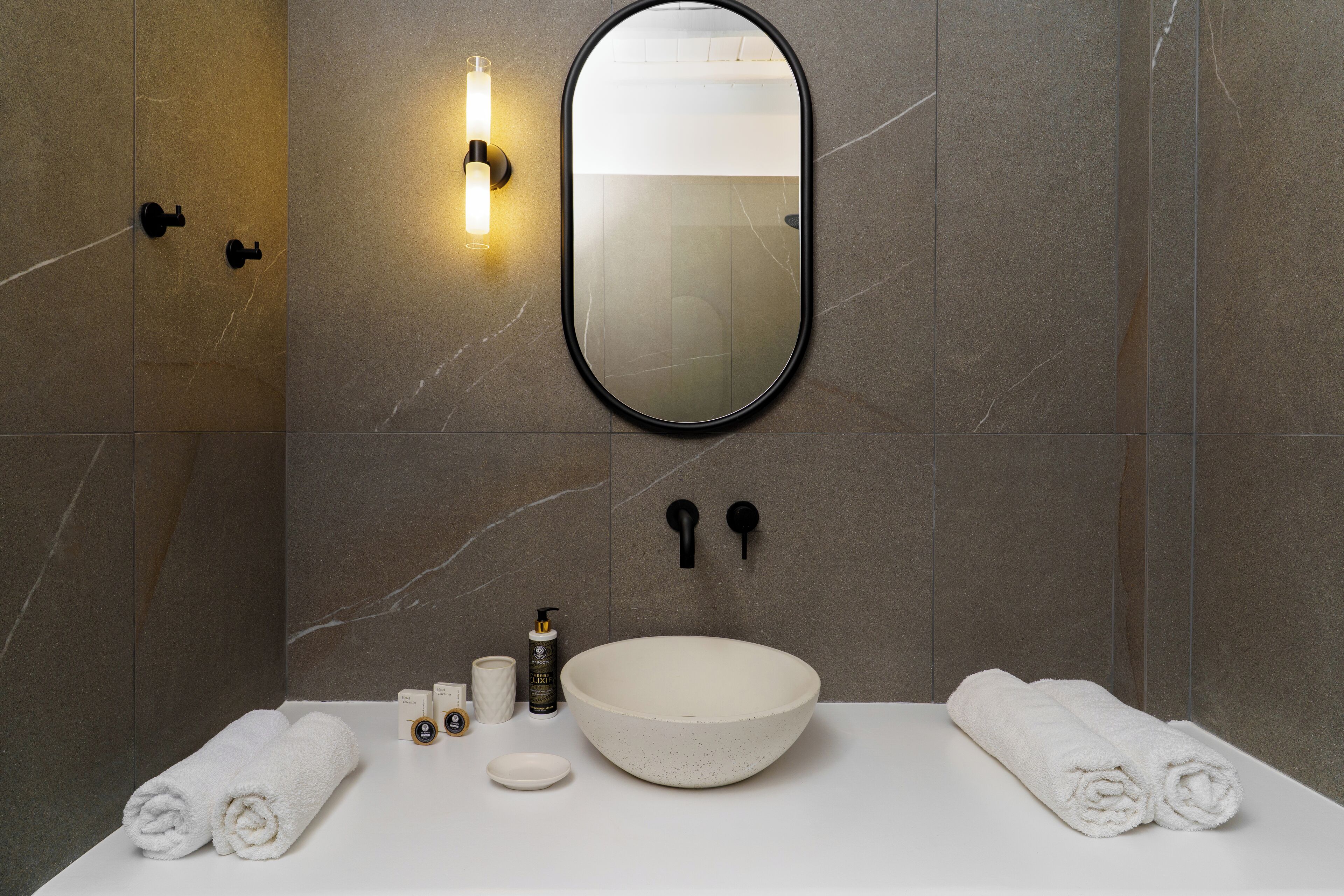 suite, jetted tub, sea view (unique white) | bathroom | shower, free toiletries, hair dryer, bathrobes