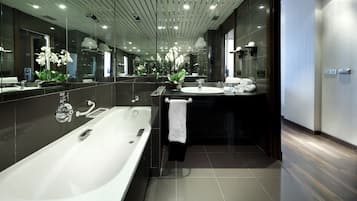 Bathtub, eco-friendly toiletries, hair dryer, bidet