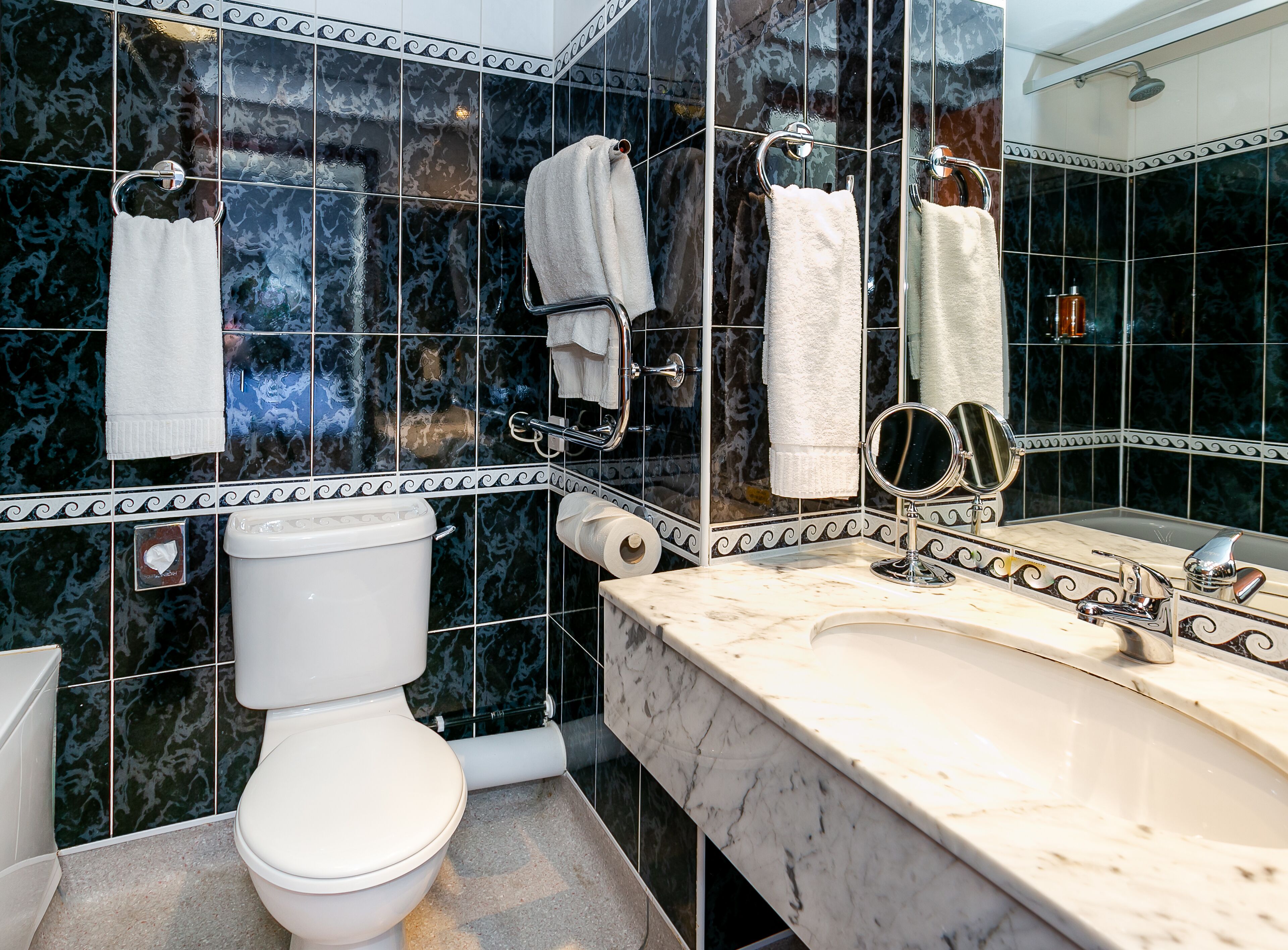 deep-soaking bathtub, free toiletries, hair dryer, bathrobes