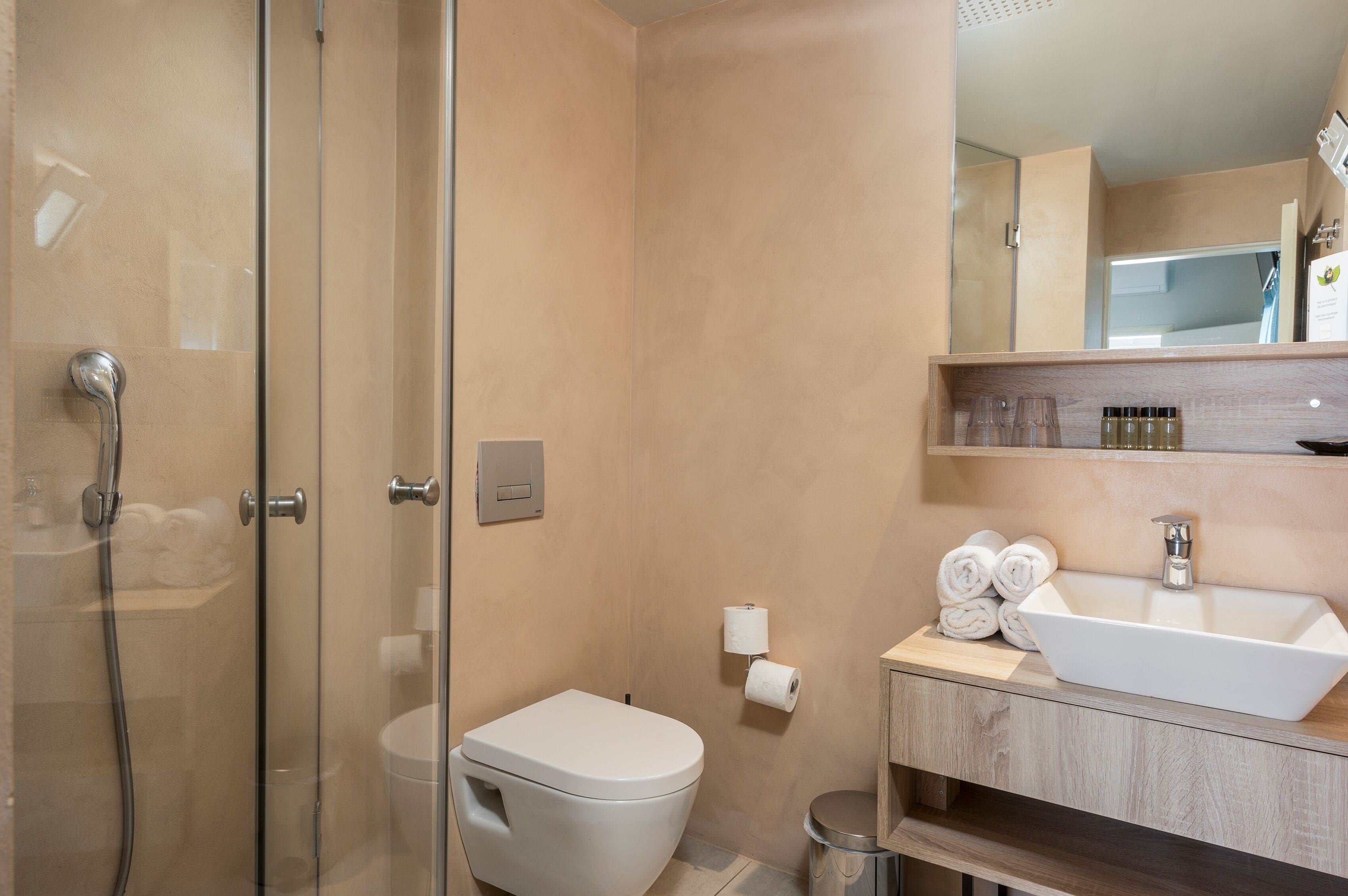 family room | bathroom | designer toiletries, hair dryer, towels, soap