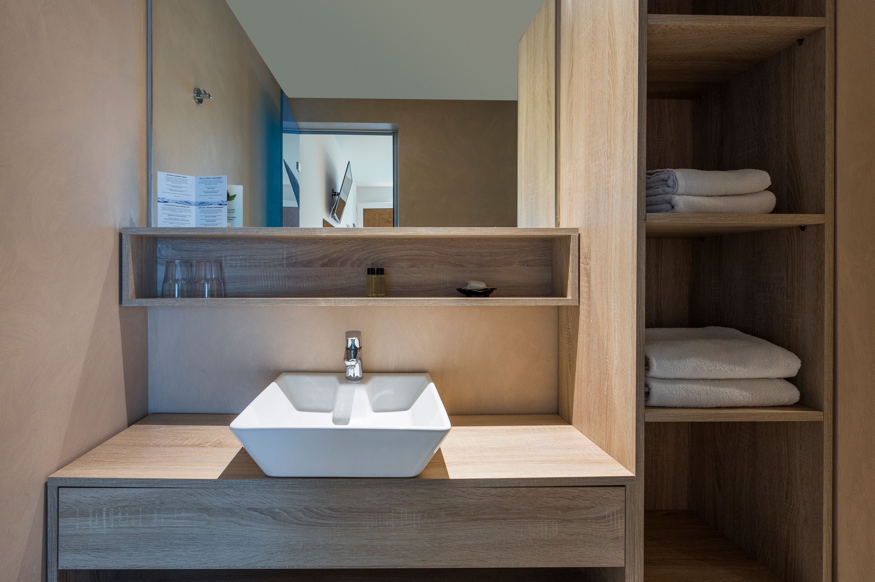 family room | bathroom | designer toiletries, hair dryer, towels, soap