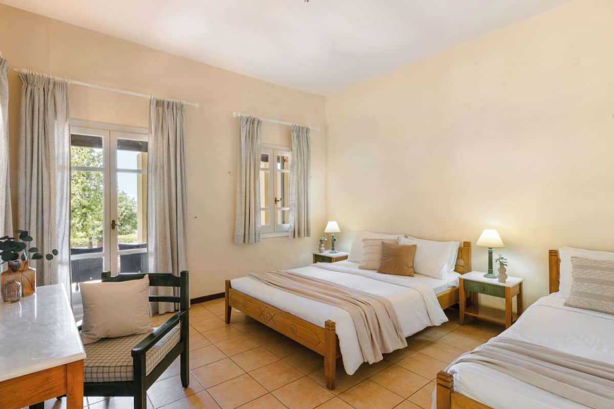 Family Apartment, 1 Bedroom, Garden View | 1 bedroom, hypo-allergenic bedding, in-room safe, individually decorated