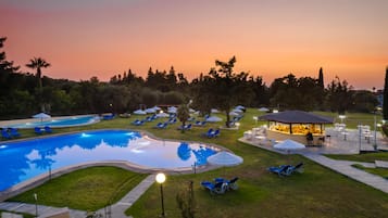 Seasonal outdoor pool, pool loungers