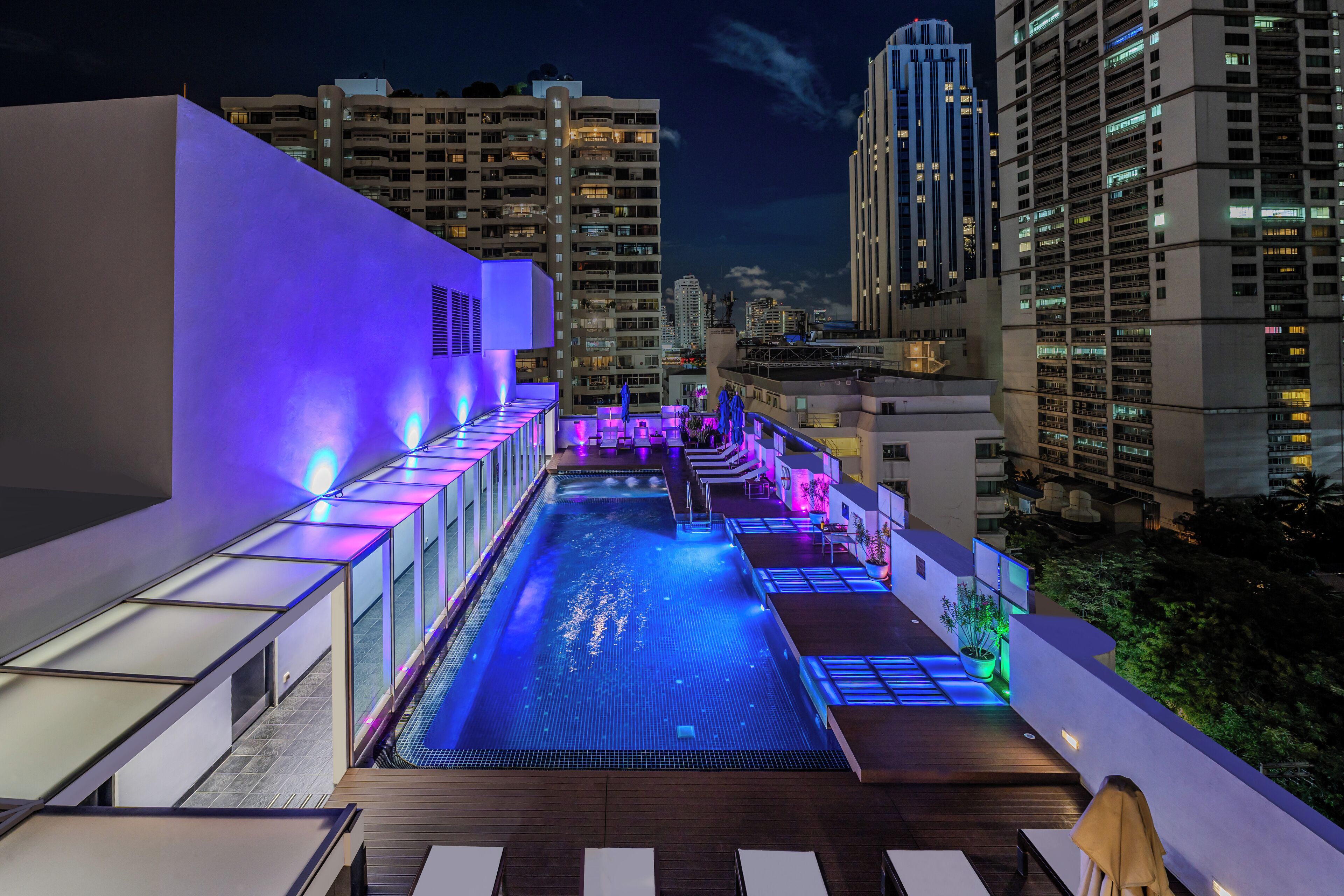 outdoor pool, open 6:00 am to 10:00 pm, pool umbrellas, pool loungers