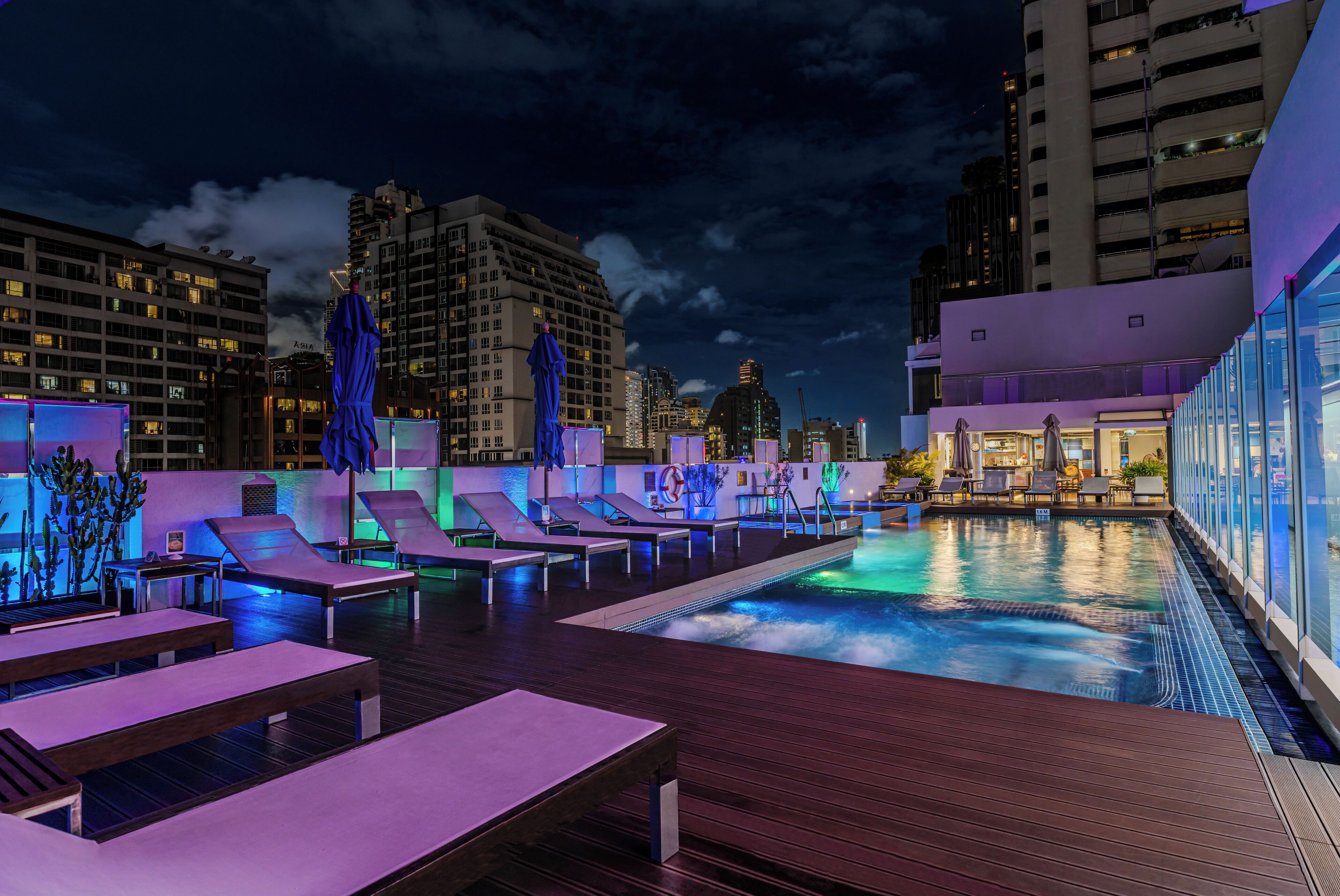 Outdoor pool, open 6:00 AM to 10:00 PM, pool umbrellas, pool loungers