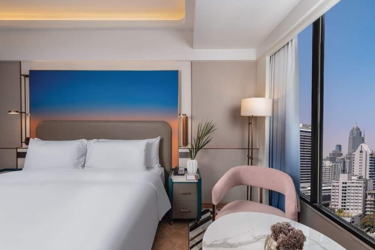 Premium bedding, down comforters, minibar, in-room safe