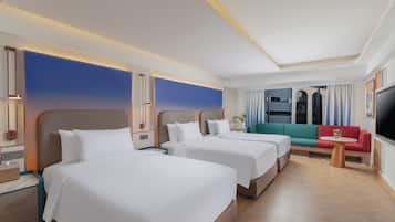 Premier Triple | Living area | 50-inch Smart TV with satellite channels