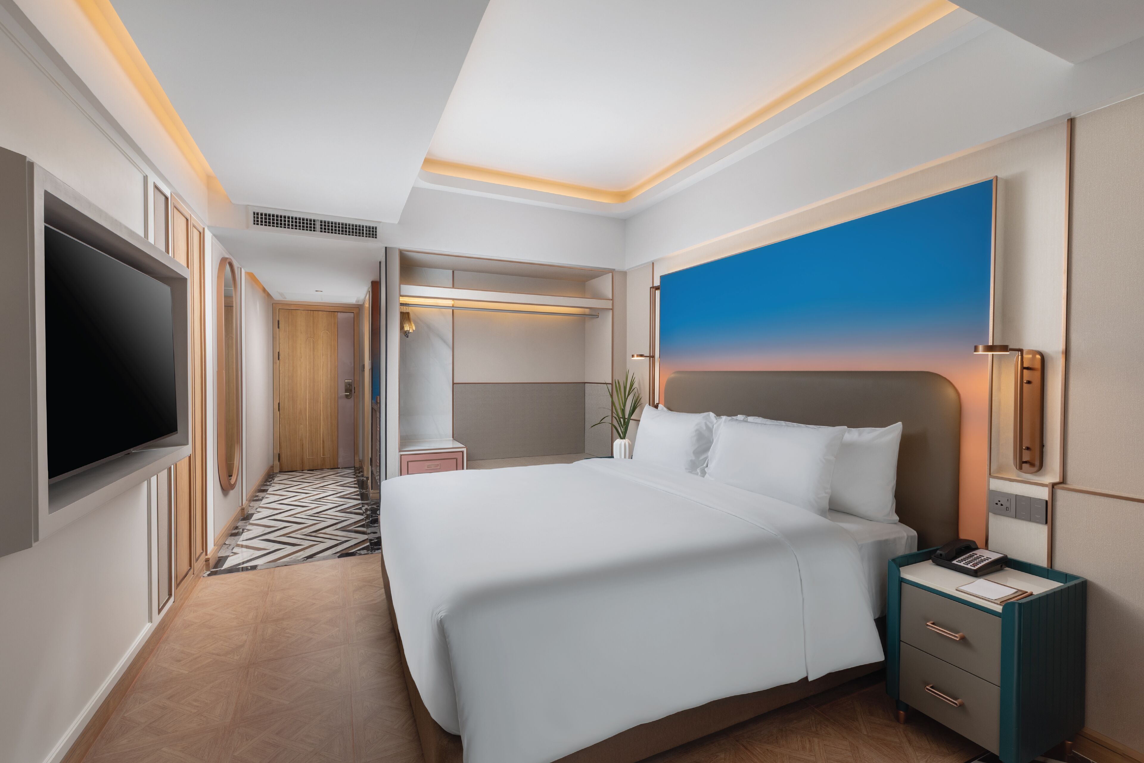 Premium bedding, down comforters, minibar, in-room safe