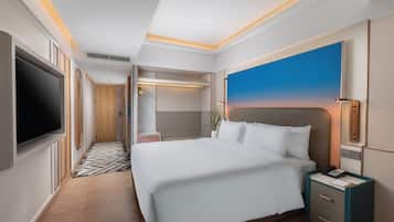 Premium bedding, down comforters, minibar, in-room safe