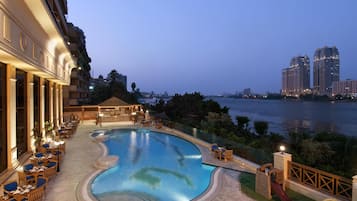 Outdoor pool, pool umbrellas, pool loungers