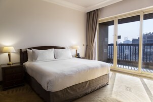 King Guest Room | Minibar, in-room safe, iron/ironing board, rollaway beds