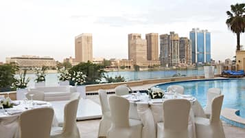 Outdoor pool, pool umbrellas, sun loungers