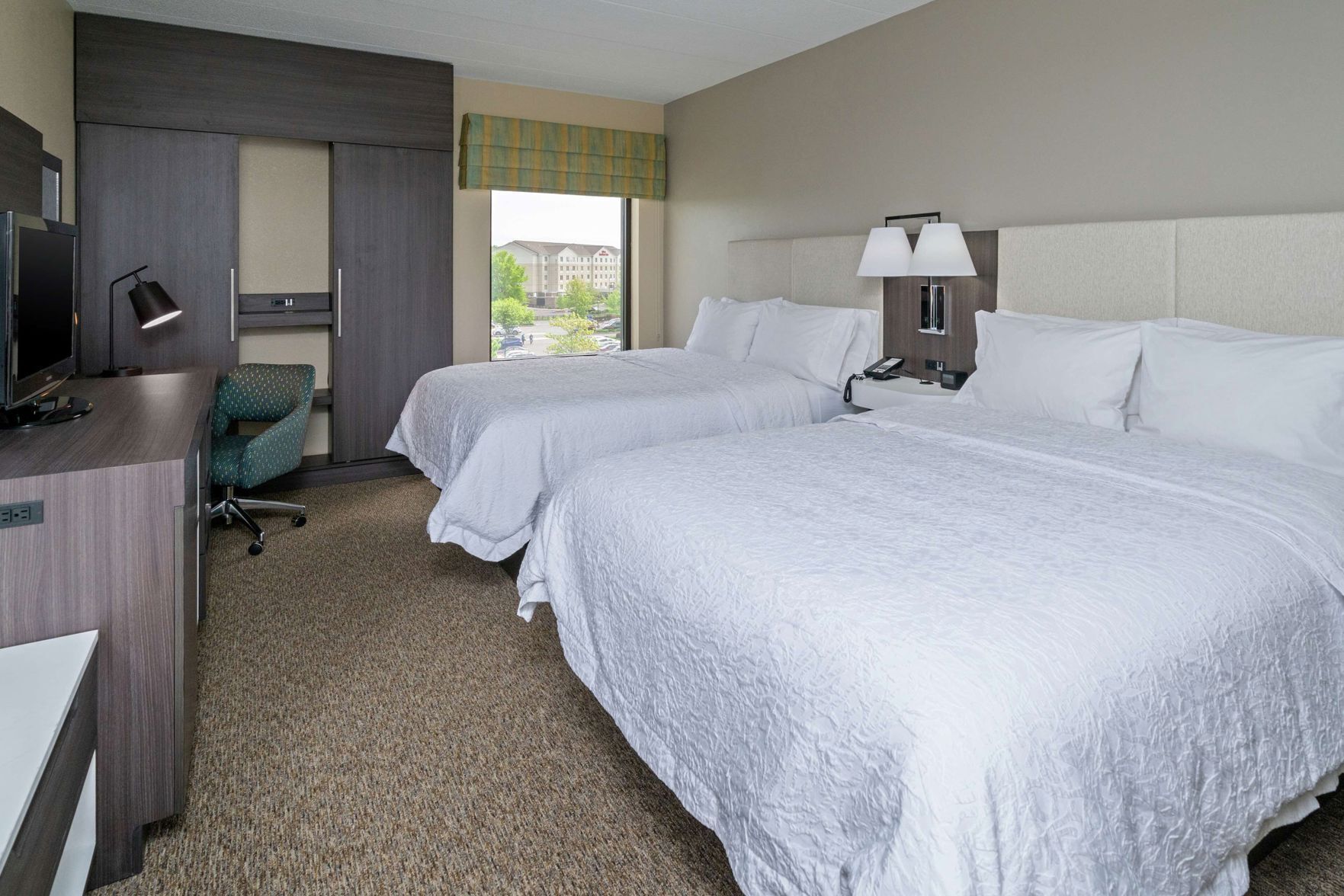 Premium bedding, down duvets, pillow-top beds, in-room safe