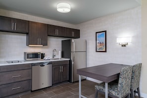 Premium bedding, down comforters, pillowtop beds, in-room safe