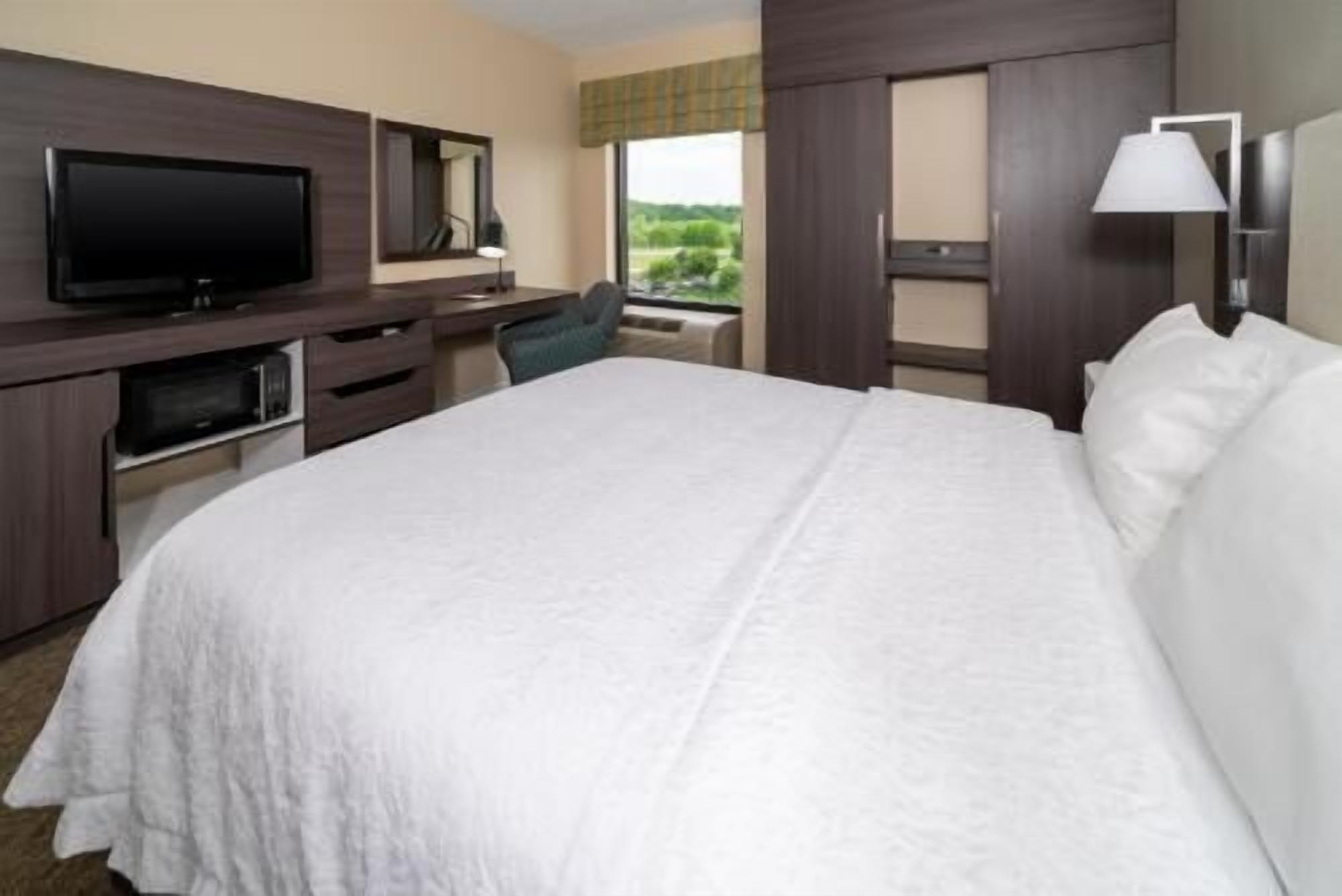 Premium bedding, down duvets, pillow-top beds, in-room safe