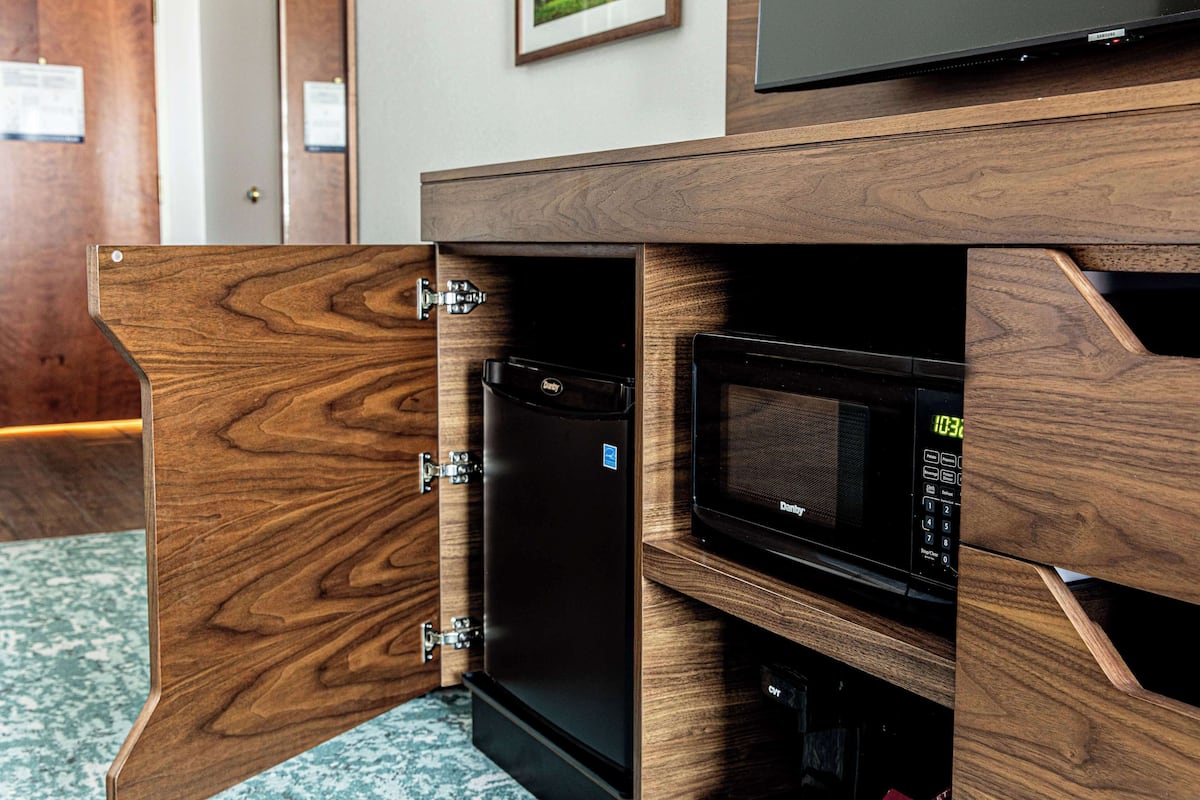 Down duvets, pillow-top beds, in-room safe, blackout curtains