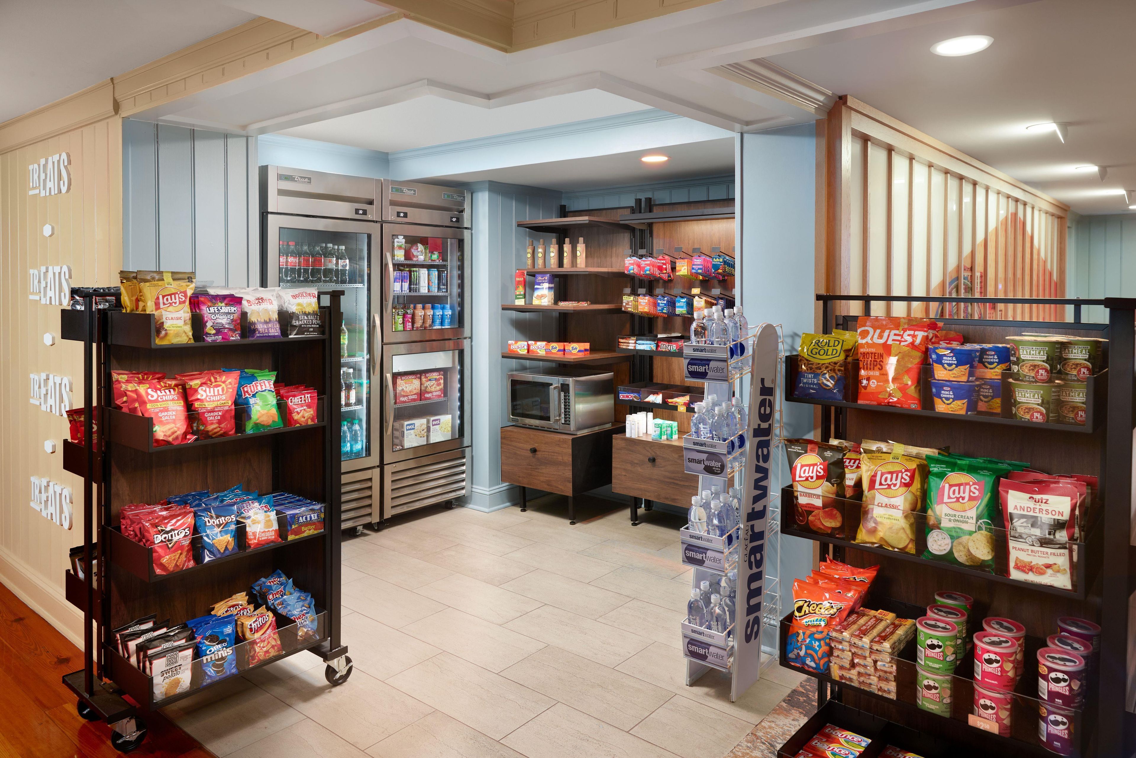 A snack and beverage section with various brands and products.