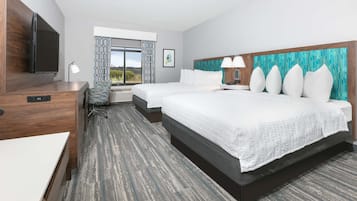 Hypo-allergenic bedding, desk, laptop workspace, blackout curtains