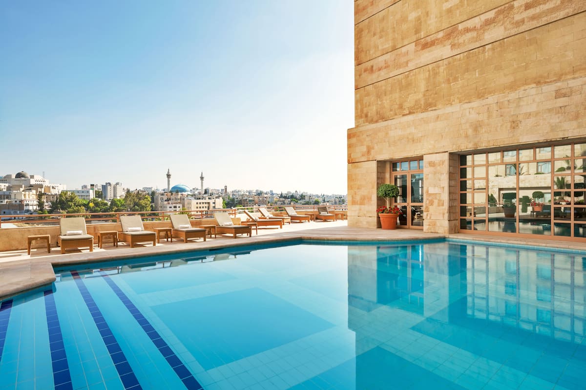 indoor pool, outdoor pool, open 6:00 am to 7:00 pm, pool umbrellas