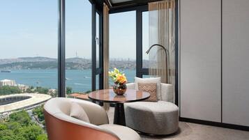 Premium Suite, Sea View | Minibar, in-room safe, desk, laptop workspace