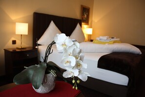 Standard Double Room | Minibar, in-room safe, blackout drapes, iron/ironing board