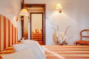 Frette Italian sheets, Select Comfort beds, minibar, in-room safe