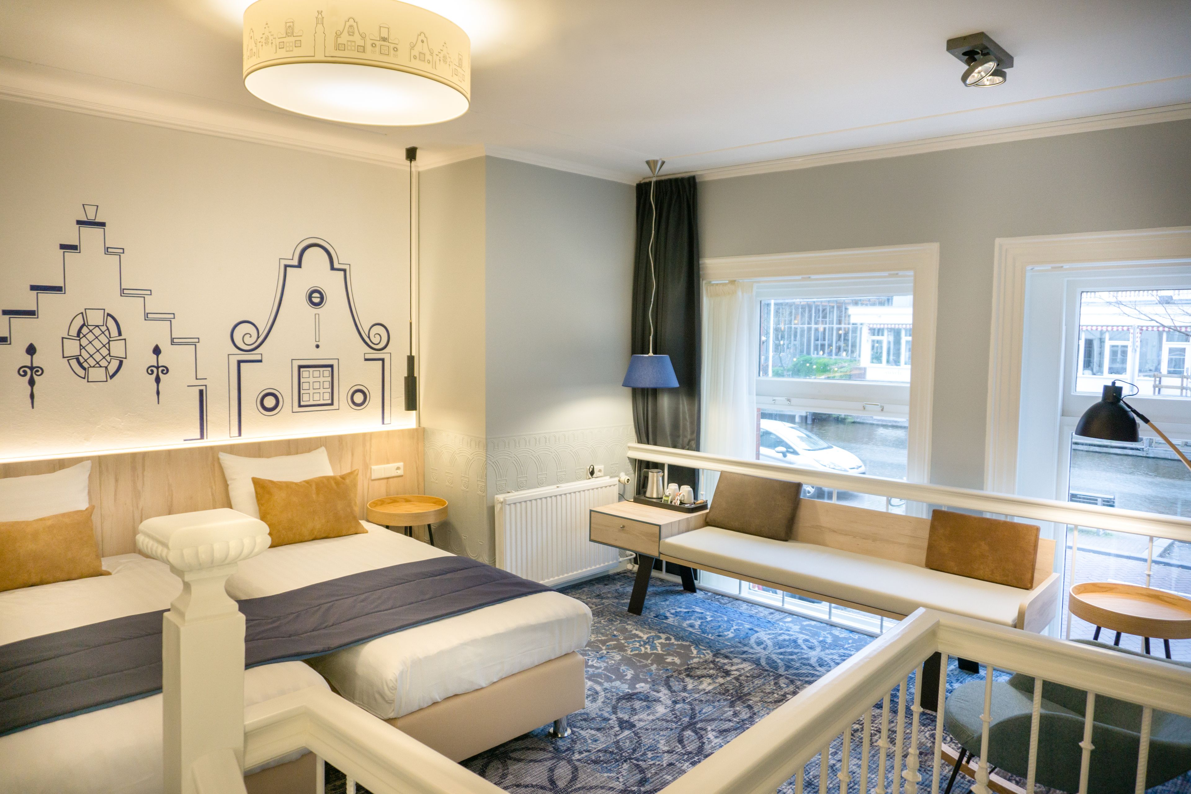 deluxe quadruple room, 2 bedrooms, canal view | premium bedding, in-room safe, desk, blackout curtains