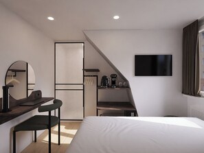 Superior tweepersoonskamer | Luxe beddengoed, een kluis op de kamer, een bureau