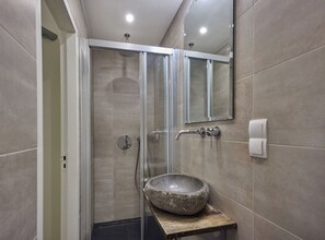 Standard Quadruple Room, Private Bathroom | Bathroom | Shower, rainfall showerhead, hair dryer