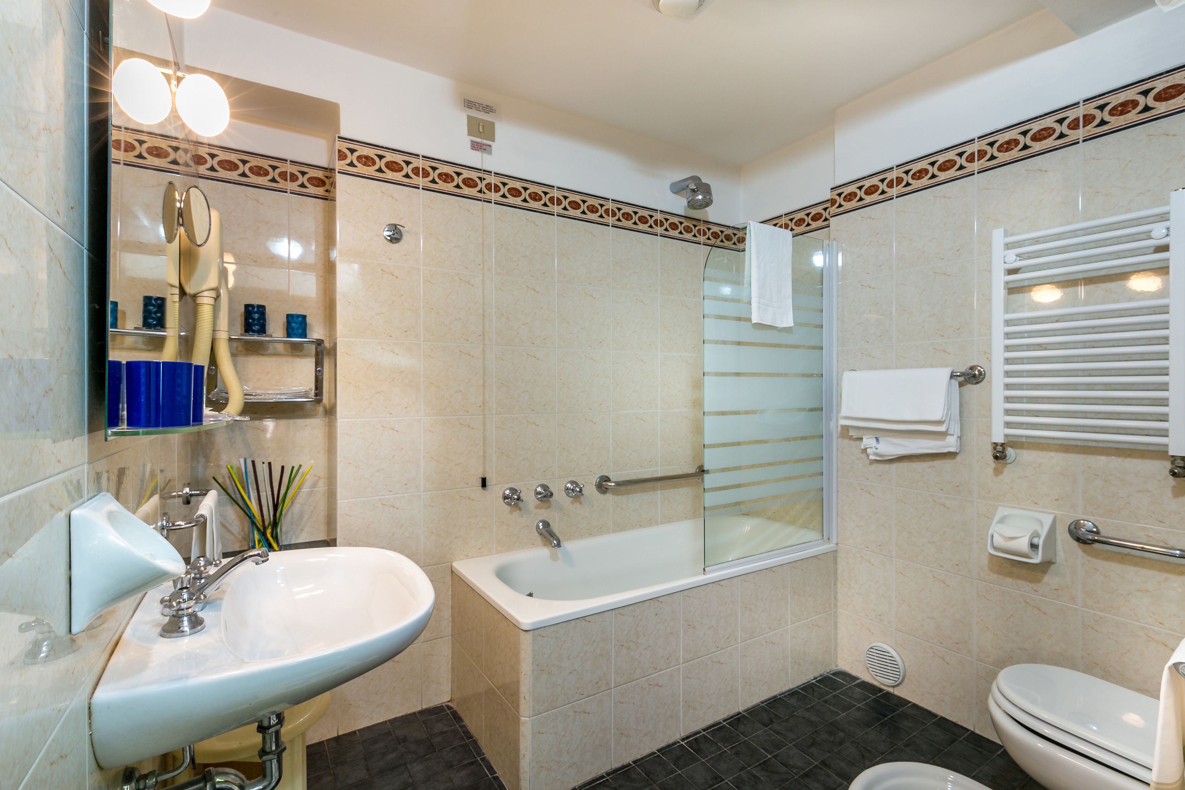 free toiletries, hair dryer, bidet, towels