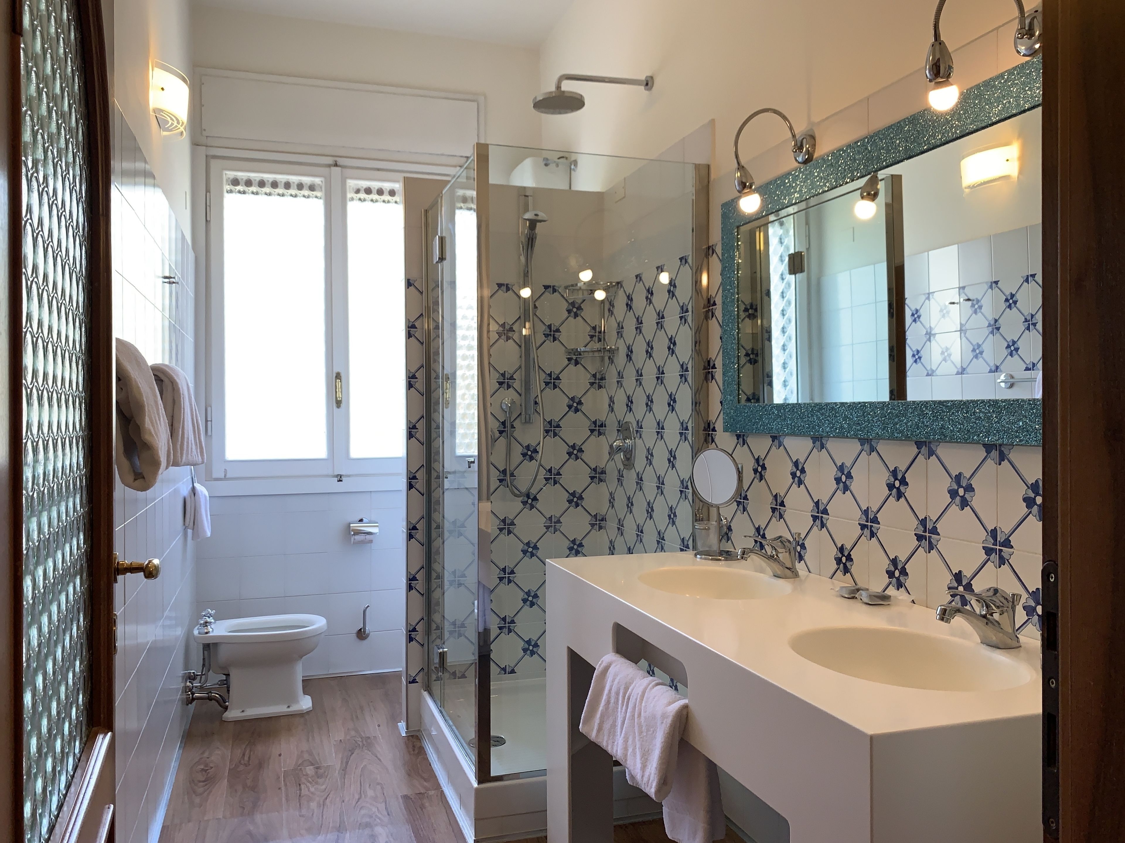 comfort room, 1 queen bed | bathroom | shower, rainfall showerhead, free toiletries, hair dryer