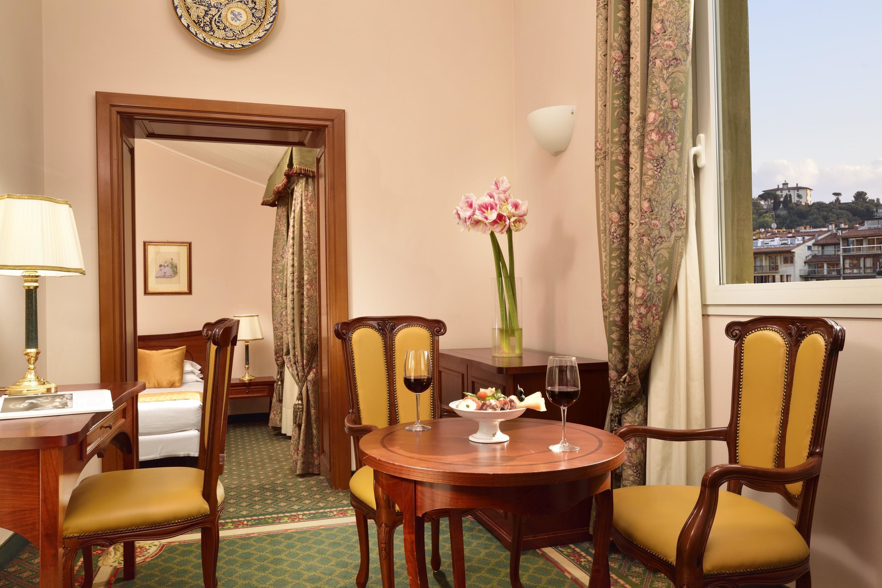 deluxe room, river view | minibar, in-room safe, desk, soundproofing