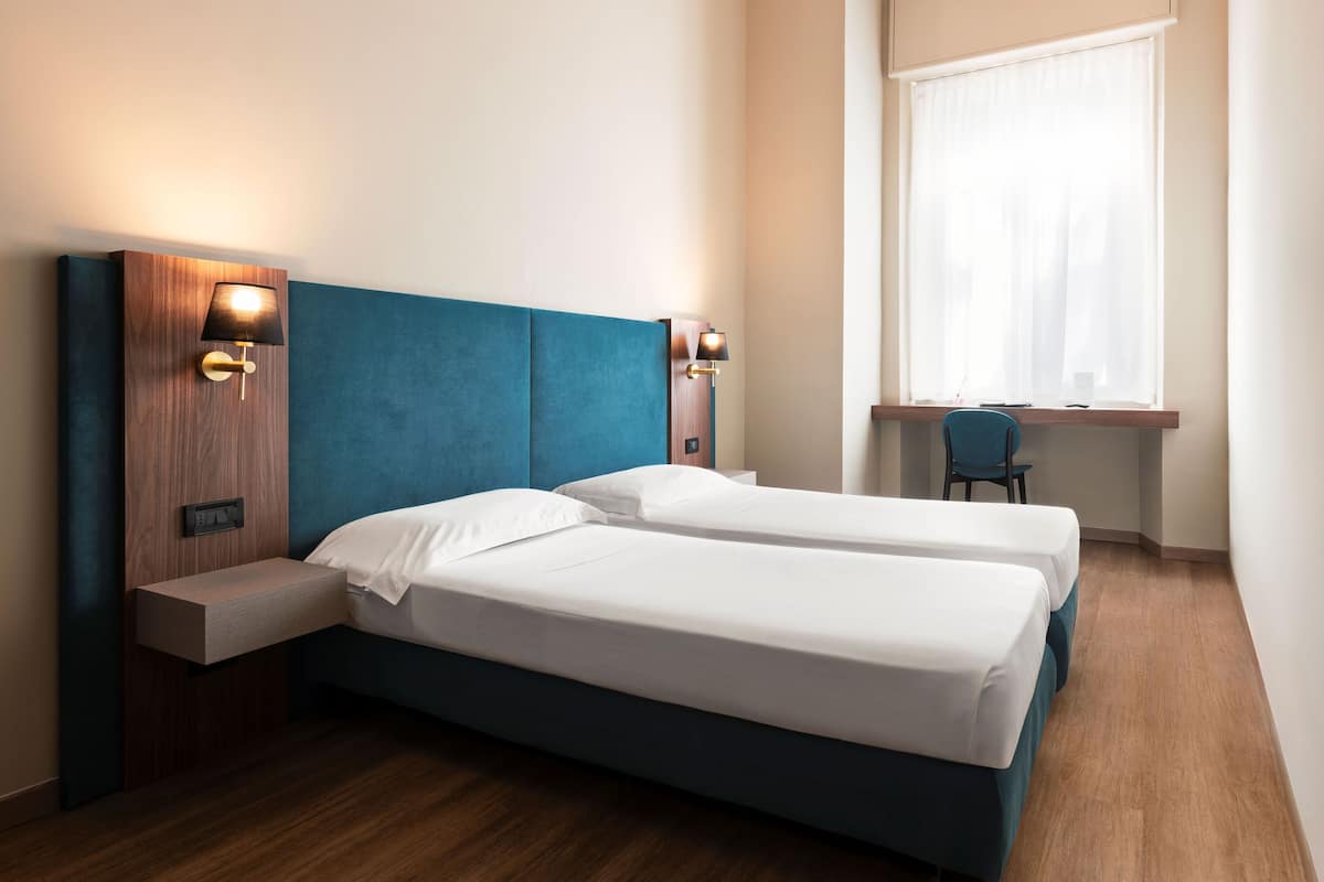 Double or Twin Room | Down comforters, minibar, in-room safe, desk