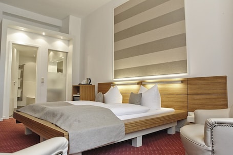 Ropa de cama hipoalergénica y minibar