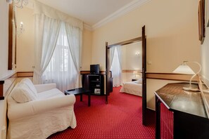 Classic Triple Room, Non Smoking, Courtyard View | Living area | TV