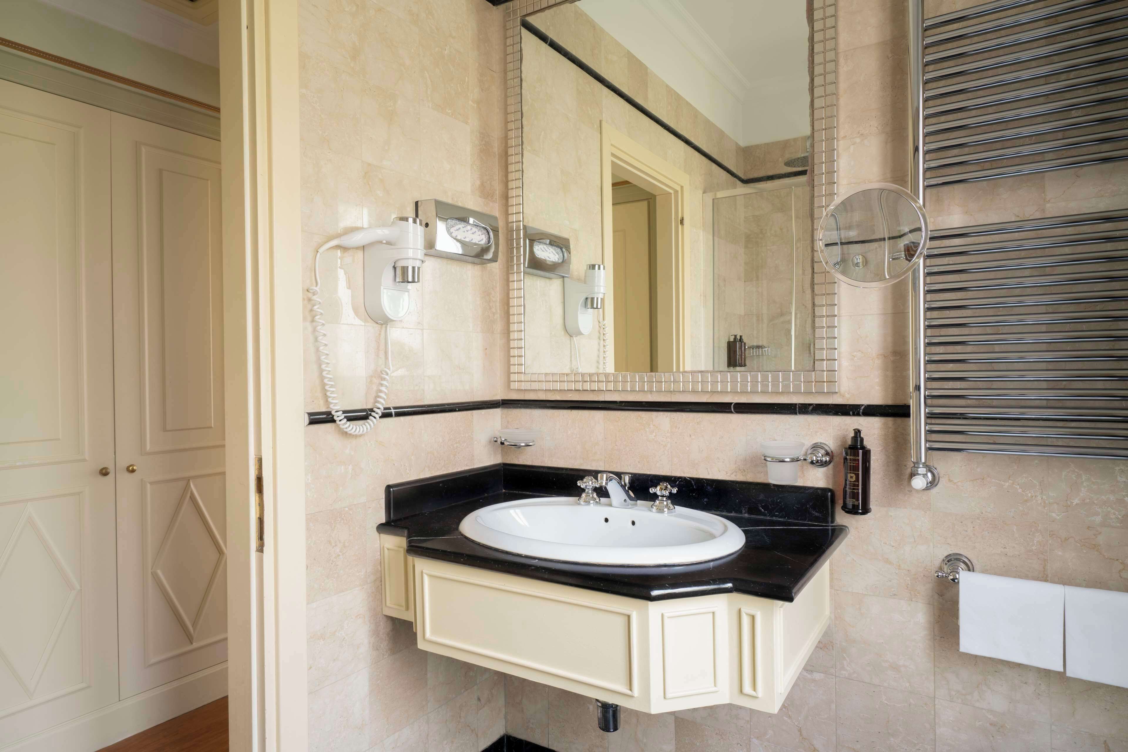 free toiletries, hair dryer, bidet, towels