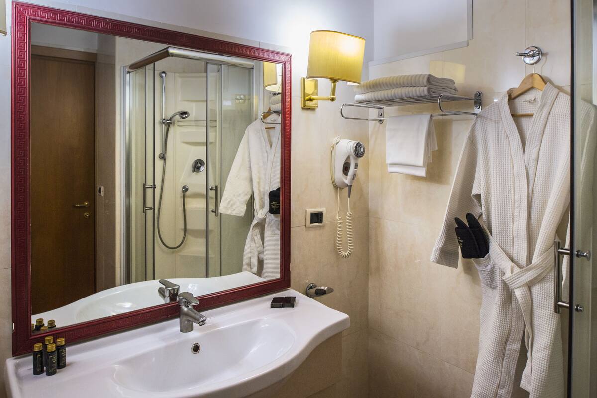Shower, free toiletries, hair dryer, bathrobes