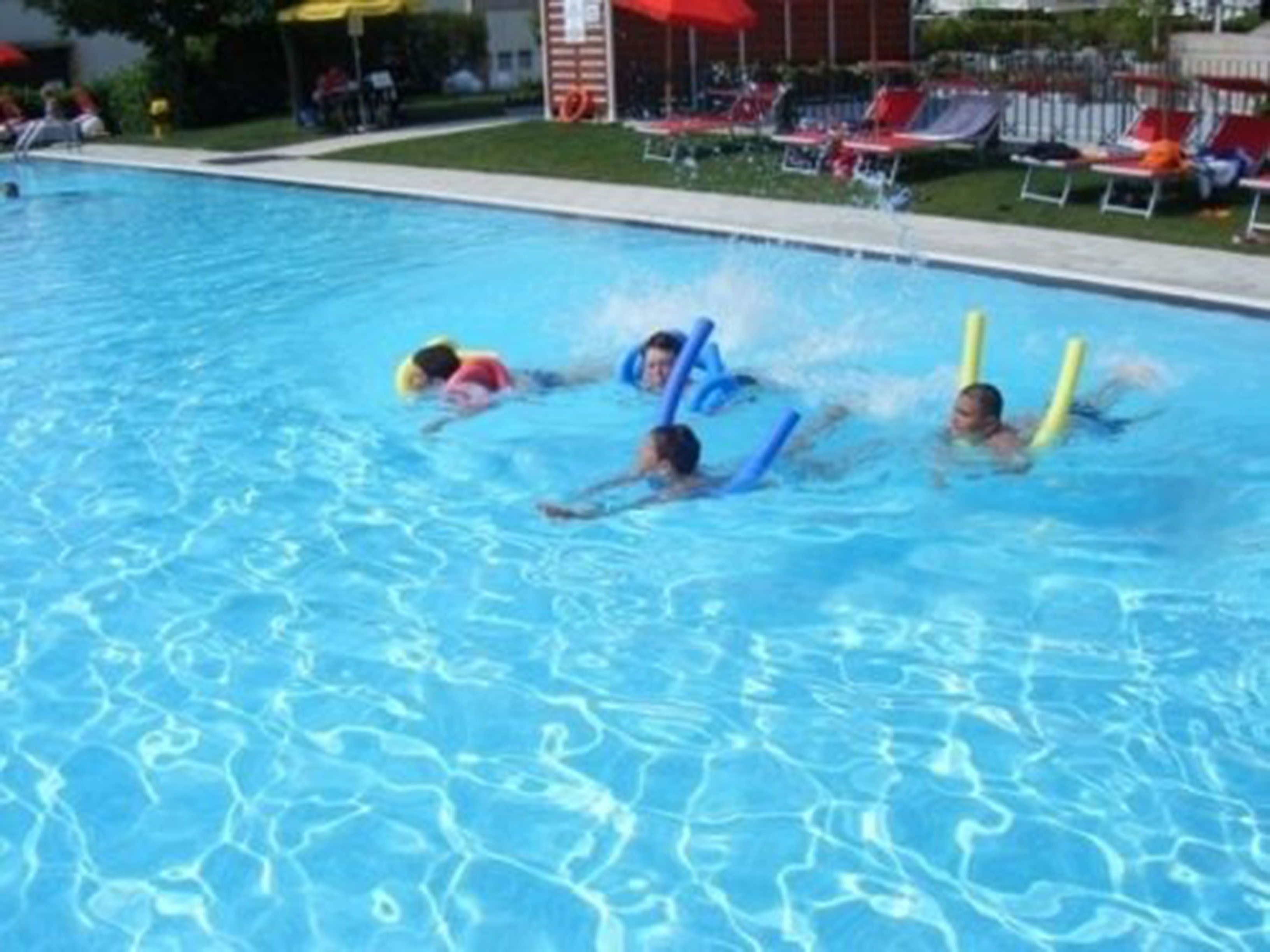 outdoor pool, pool umbrellas, pool loungers