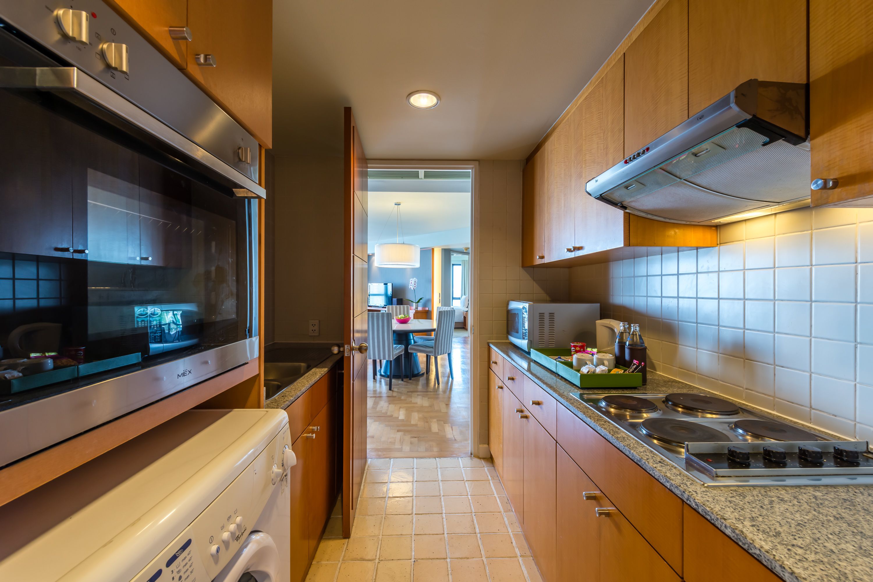 grand deluxe 3-bedroom twin | private kitchen | full-sized fridge, microwave, stovetop, electric kettle
