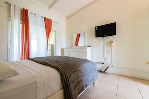 Apartment, 1 Queen Bed, Kitchenette, Sea View | 1 bedroom, iron/ironing board, free WiFi, bed sheets