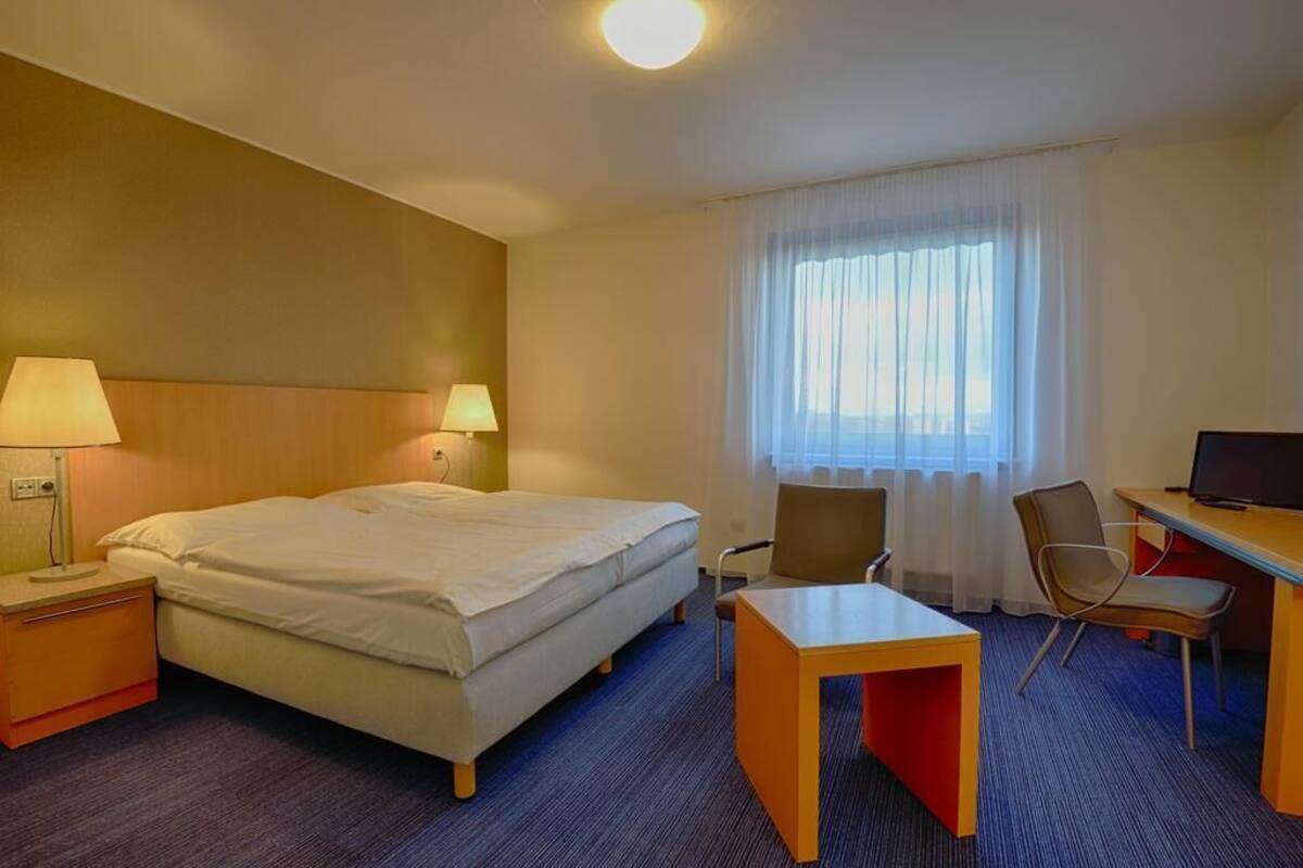 Desk, laptop workspace, blackout drapes, soundproofing