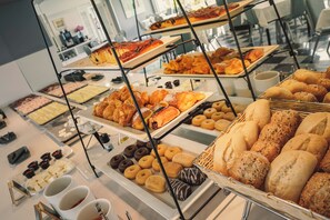 Daily buffet breakfast (EUR 12.00 per person)