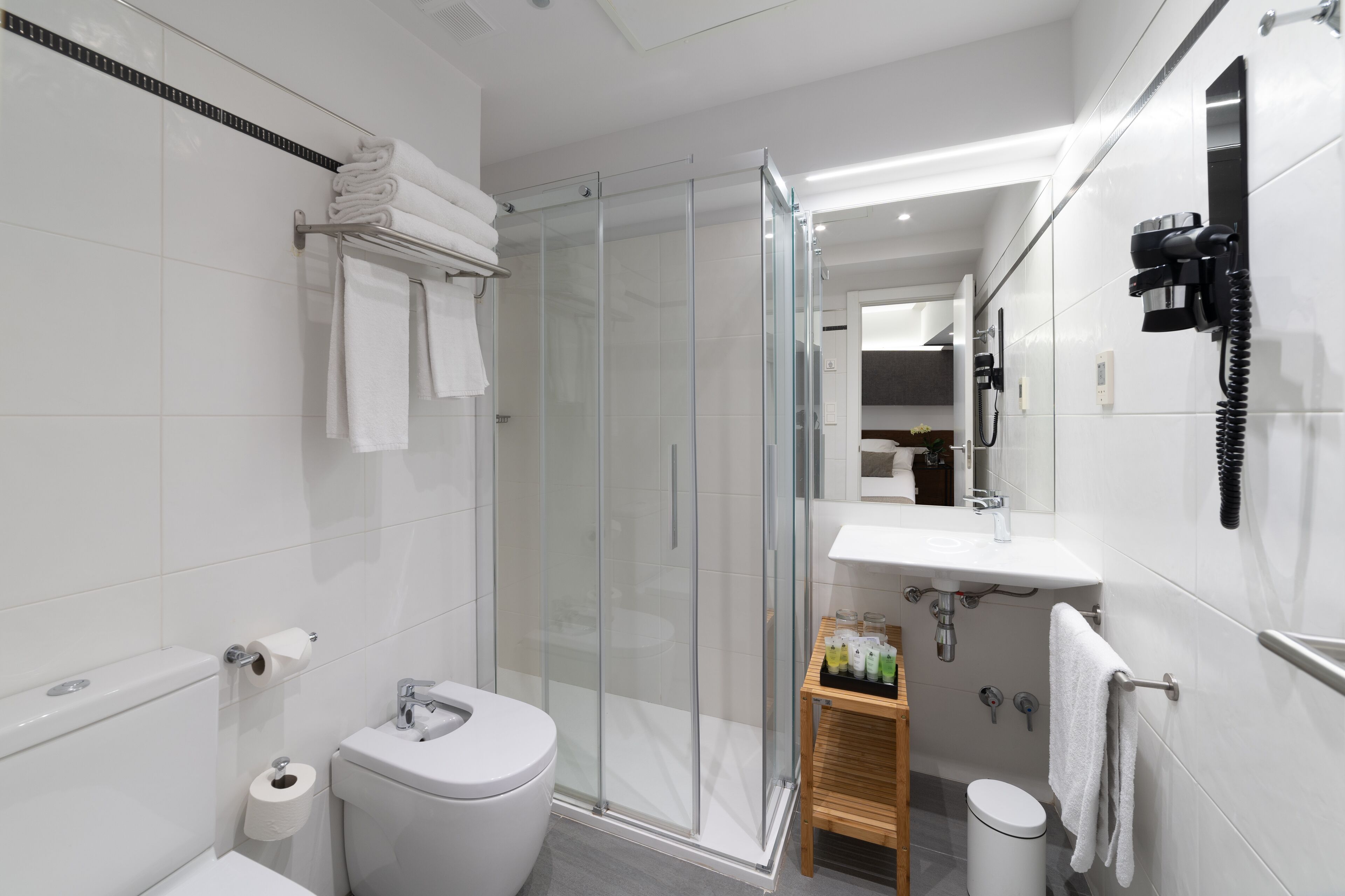 free toiletries, hair dryer, bidet, towels