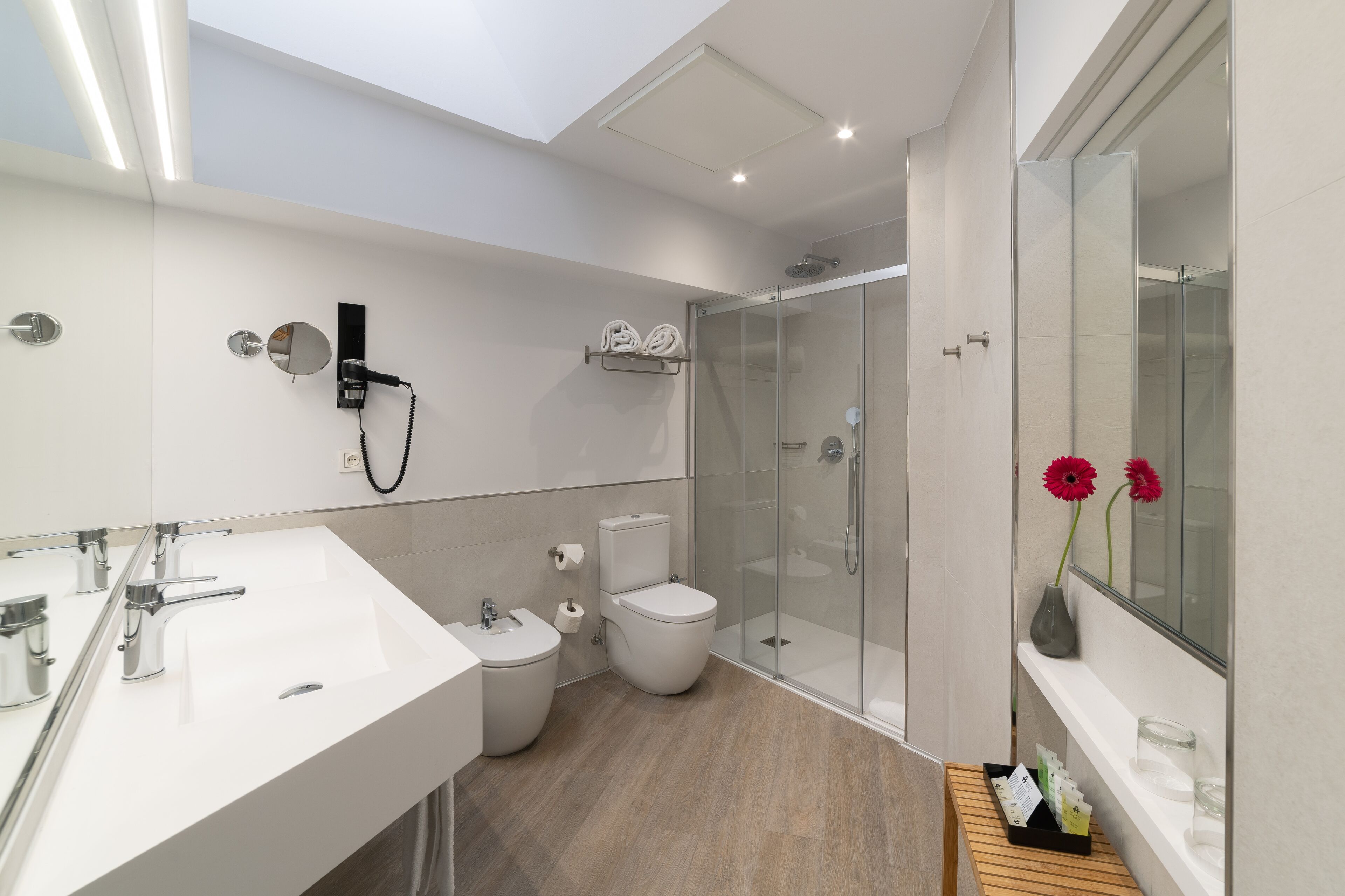 premium quadruple room | bathroom | free toiletries, hair dryer, bidet, towels