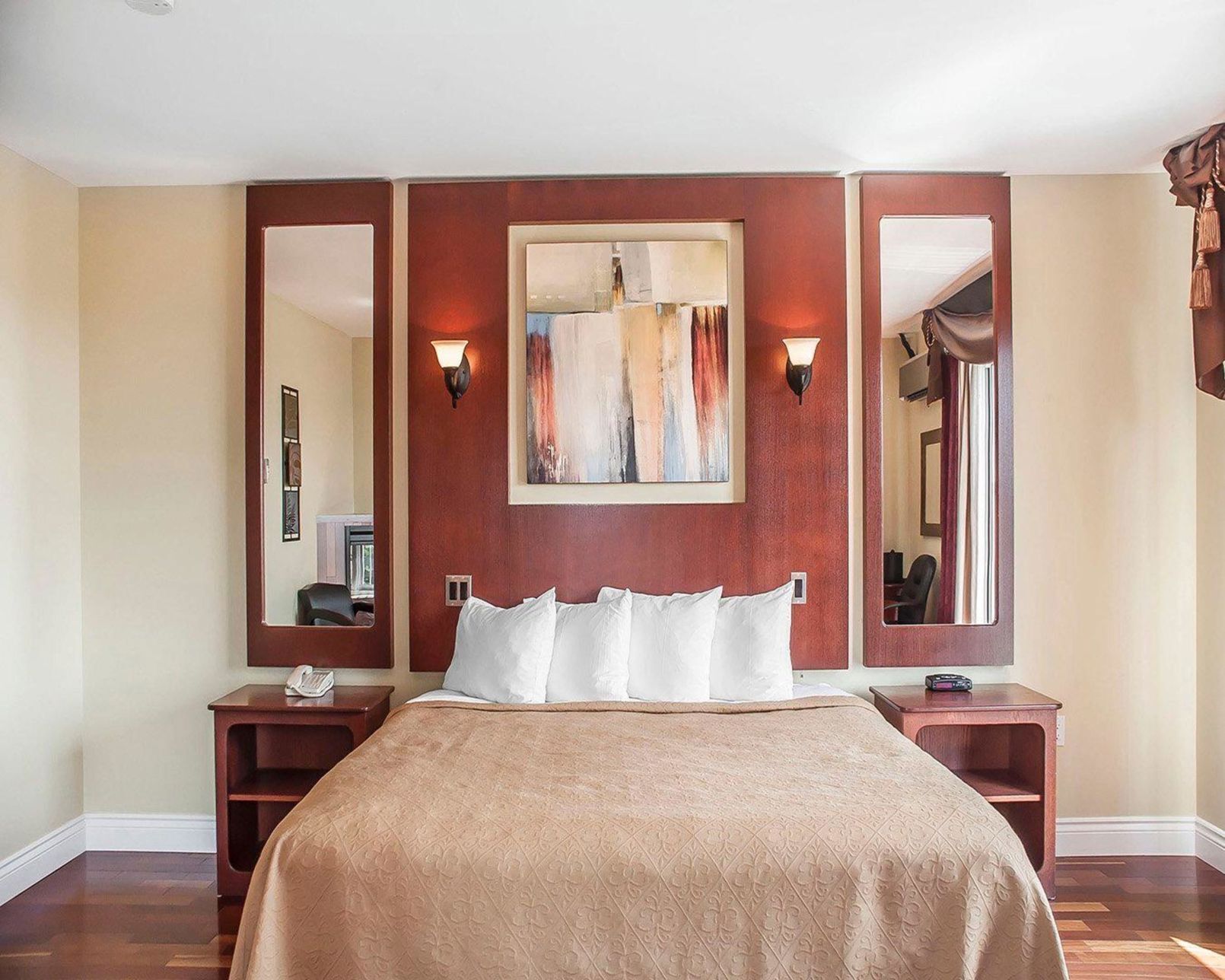 Desk, iron/ironing board, bed sheets, alarm clocks