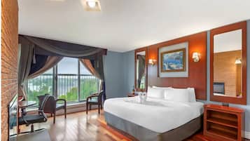 Desk, iron/ironing board, bed sheets, alarm clocks