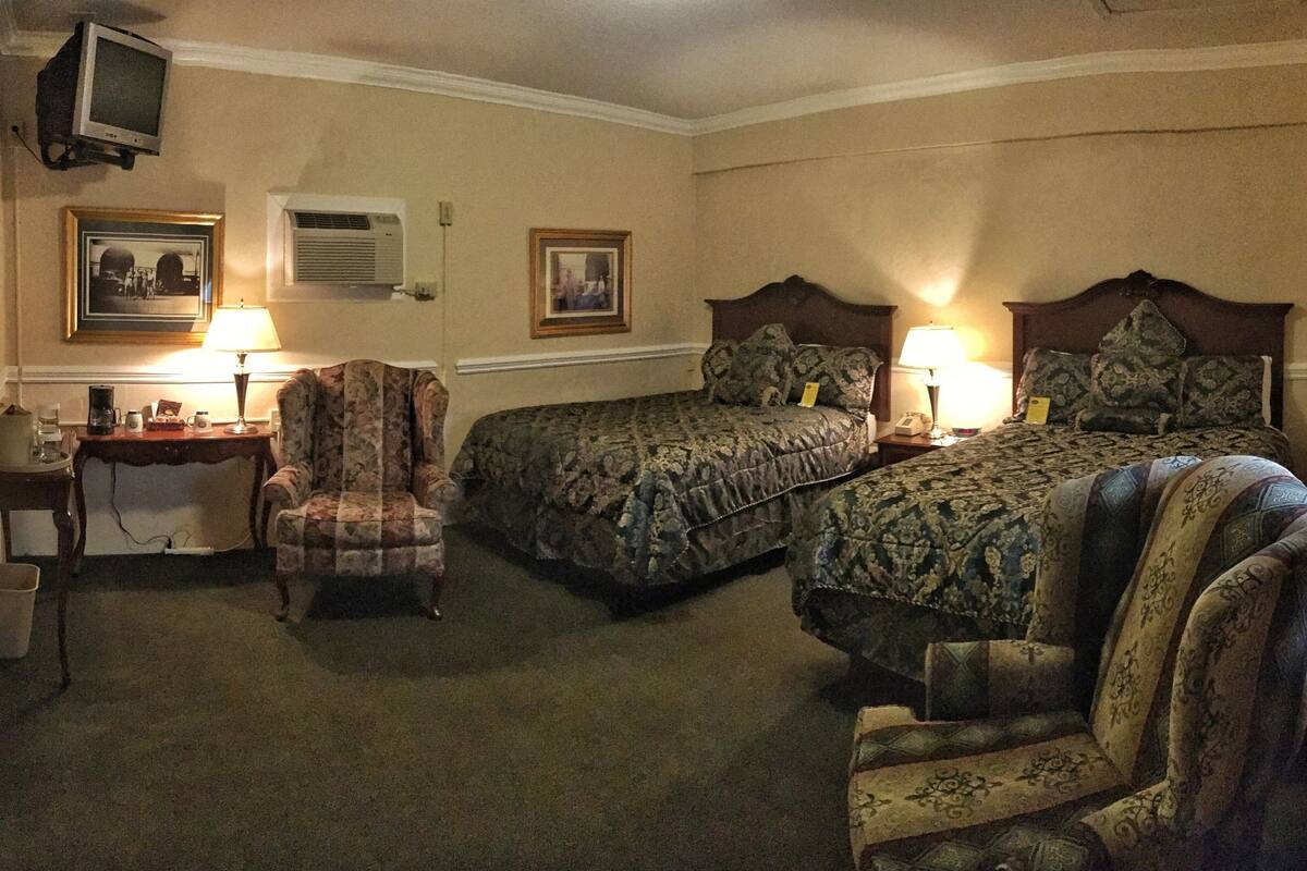 signature room, 2 queen beds, annex building (located beside the historic inn) | desk, iron/ironing board, free wifi, bed sheets
