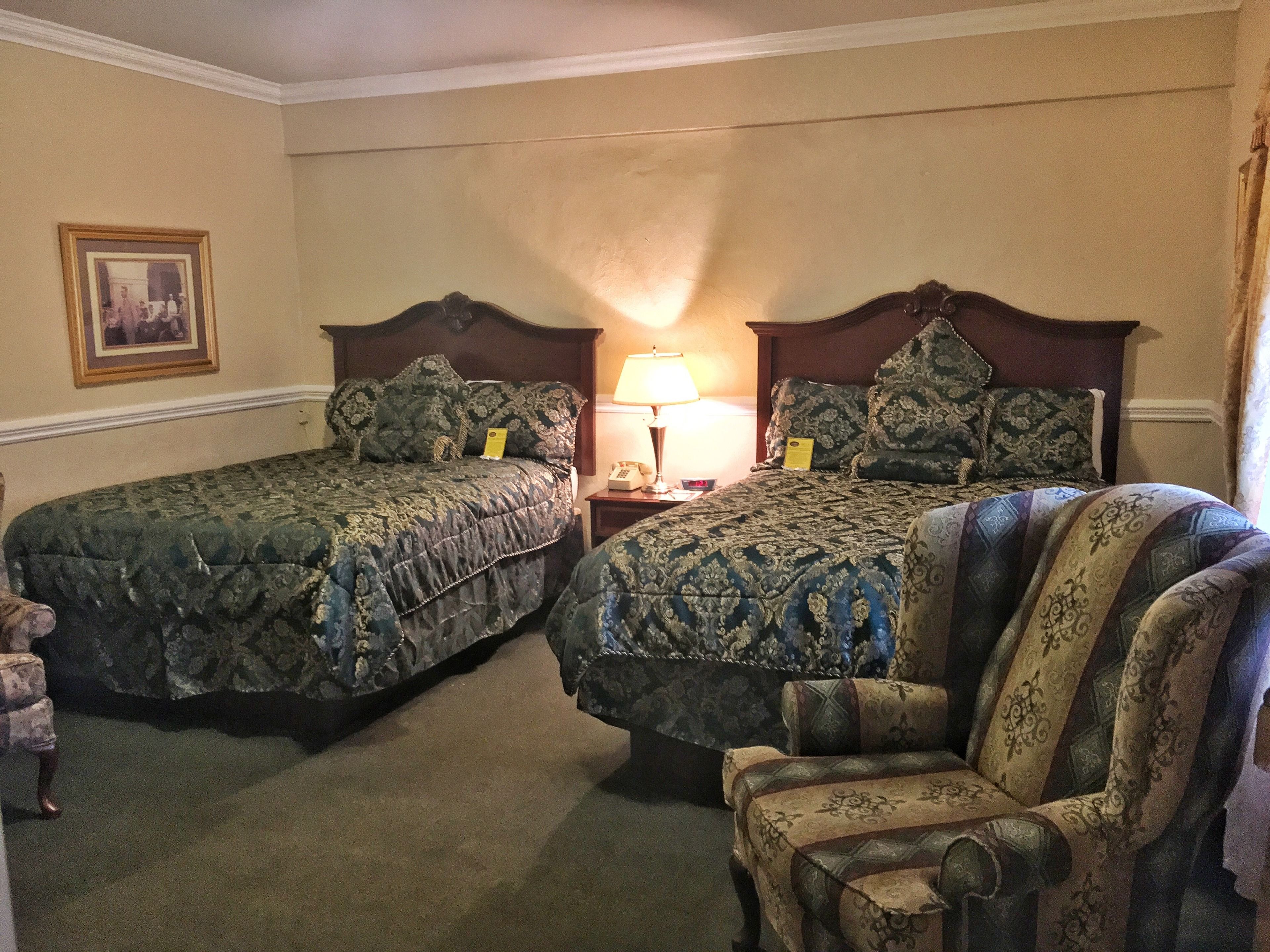 signature room, 2 queen beds, annex building (located beside the historic inn) | desk, iron/ironing board, free wifi, bed sheets